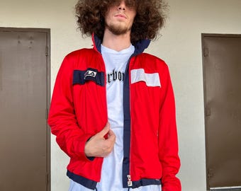 Cherry red Gore-Tex FILA jacket 90’s