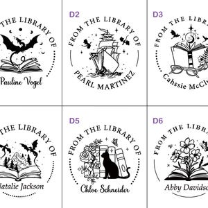 May include: A collection of six black and white circular stamps, each featuring the text "FROM THE LIBRARY OF" around a central design. Designs include a bat over a book, a ship, an open book with glasses, a mountain scene, a cat with books, and flowers.
