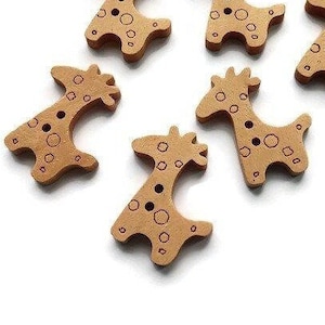 May include: Six wooden buttons shaped like giraffes with brown spots and a red outline. The buttons have two holes for sewing.