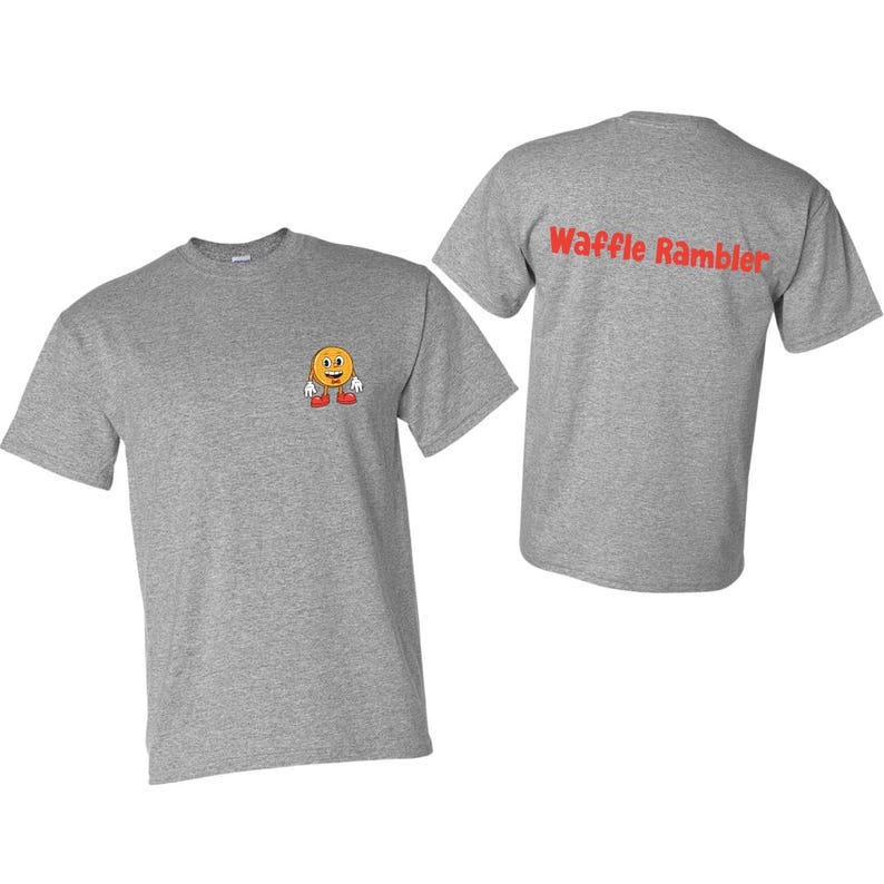 Puede incluir: Camiseta gris con un personaje de waffle sonriente en la parte delantera y el texto "Waffle Rambler" en la parte posterior.