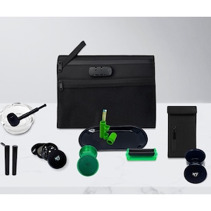 May include: A collection of black and green smoking accessories, including a zippered pouch with a combination lock, a glass ashtray with a pipe, and various grinders and rolling tools. The items are arranged on a white surface.