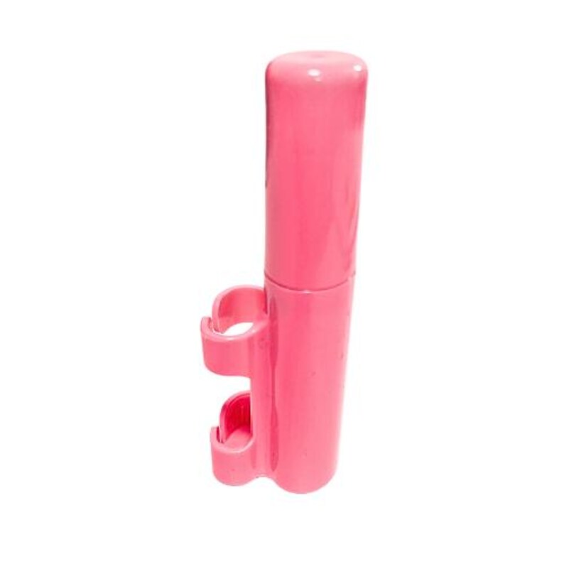 May include: A bright pink cylindrical plastic holder featuring a smooth, rounded top cap and two integrated C-shaped clips extending from the side, designed for securing items to a vertical surface or rod with a uniform glossy finish.