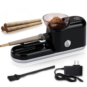 May include: A black electric cigarette rolling machine with a clear bowl filled with tobacco. Three pre-rolled cigarettes are to the left. A black brush and power adapter are also included.