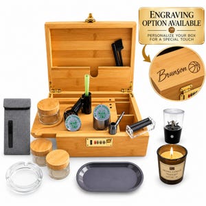 May include: A bamboo storage box with a combination lock, containing glass jars with bamboo lids, a metal pipe, a rolling machine, a brush, and a grinder. Includes a grey pouch, a clear glass ashtray, a grey tray, and a candle. Text reads: ENGRAVING OPTION AVAILABLE.