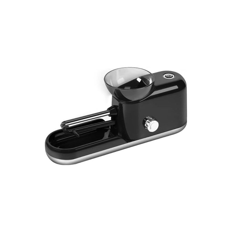 May include: A black and silver electric cigarette rolling machine. The device has a rounded body with a silver trim, a clear plastic bowl, and a lever. The machine is designed to roll cigarettes.