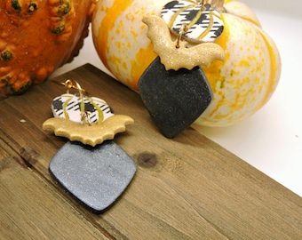 Clay Plaid and gold earrings with bat