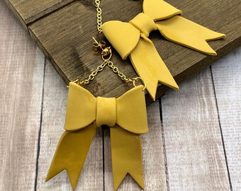 Golden Bow lightweight large statement earrings