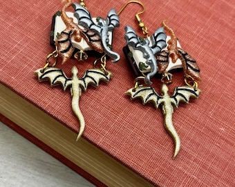 Flying dragon book earrings