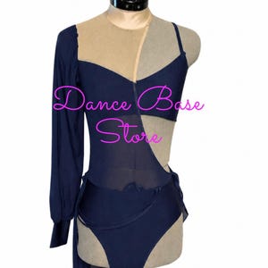 May include: A navy blue dance leotard featuring a sheer mesh panel across the chest and torso, a single long sleeve, and a thin strap on the opposite side. The garment includes a draped fabric accent on the hip and displays the text Dance Base Store.