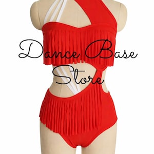 May include: Red dance costume with fringe detailing and cut-out design. Features a halter neckline and white straps. The text "Dance Base Store" is visible on the front.