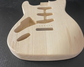 Left-Hand Stratocaster Style Guitar Body – SSS – White Ash – 2-Piece – CNC Cut – Unfinished – 4.15 lbs