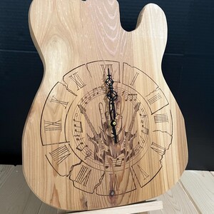 Cedar Guitar Body Wall Clock • Laser Engraved • Roman Numerals • Quartz Movement • Polyurethane Finish