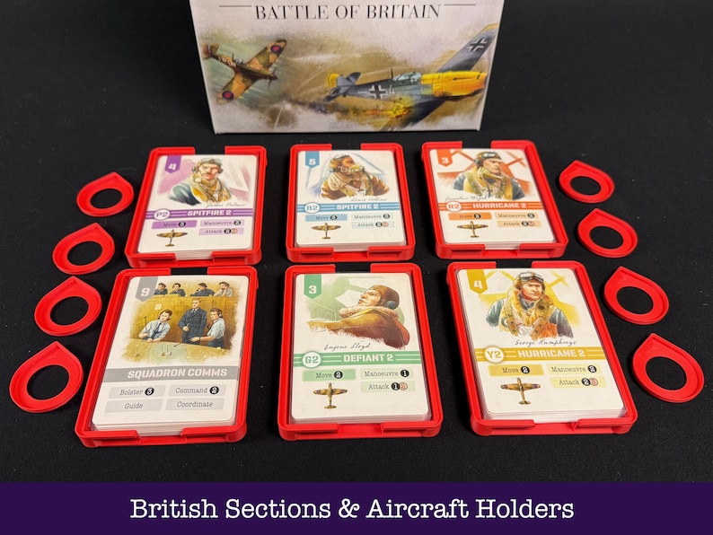 May include: A board game set featuring cards with pilot illustrations and aircraft, held in red card holders. The box is labelled "Battle of Britain". Includes red game pieces. The text "British Sections & Aircraft Holders" is visible.