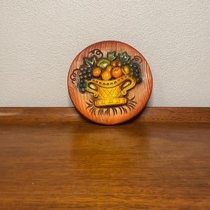 Vintage Mid Century Modern MCM Round Chalk Ware Plaque with Fruit Basket 5&quot; 1968 Miller Studio