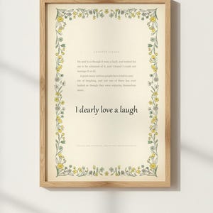May include: A framed print featuring a cream-colored background with a floral border of yellow and green flowers. The text reads: Chapter Eleven, a quote about laughing, the phrase I dearly love a laugh, and Follies and Nonsense, Whims and Inconsistencies.