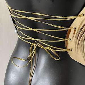 one shoulder corset,
gold acrylic corset,
wet look bustier,
metallic bustier,
luxury acrylic wear,
party outfit gift,
lacquer acrylic top,
high fashion corset,
luxury gift top,
stage wear bustier,
molten acrylic top,
DJ performance top,
dramatic outfit piece,