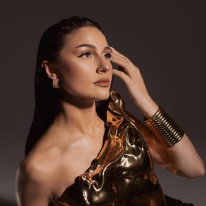one shoulder corset,
gold acrylic corset,
wet look bustier,
metallic bustier,
luxury acrylic wear,
party outfit gift,
lacquer acrylic top,
high fashion corset,
luxury gift top,
stage wear bustier,
molten acrylic top,
DJ performance top,
dramatic outfit piece,