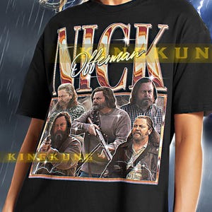 May include: Black unisex t-shirt with a retro graphic of Nick Offerman and the name "NICK". The design includes multiple images of the actor. The model is wearing an XL shirt.