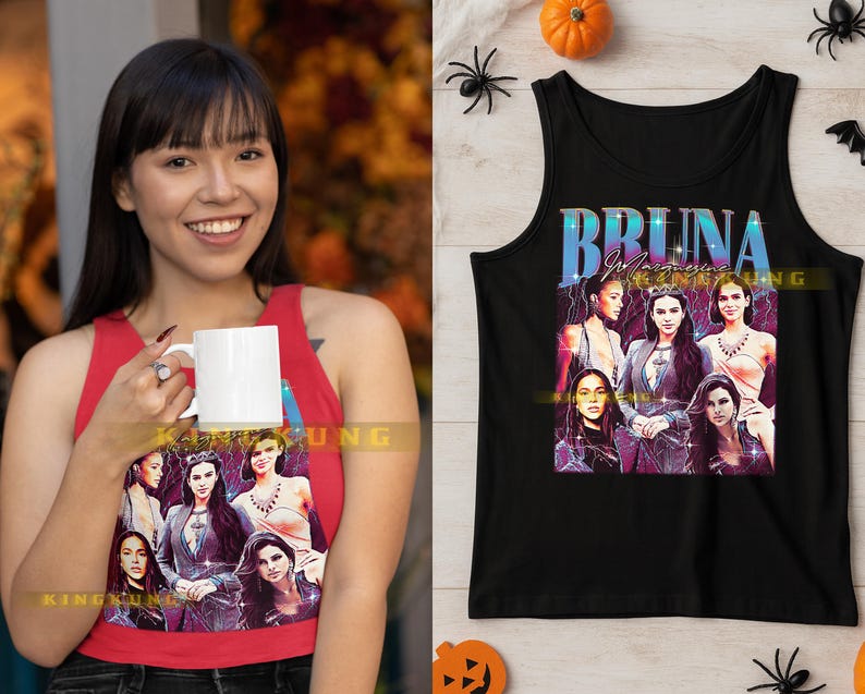 May include: A black tank top featuring a graphic of six women with the text "BRUNA MARQUEZINE" in a stylized font. The tank top is displayed on a white surface with Halloween decorations.