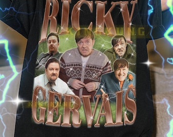 May include: Black t-shirt featuring a vintage-style graphic of Ricky Gervais and other actors. The design includes the text "RICKY GERVAIS" in a retro font. The shirt is a unisex style.
