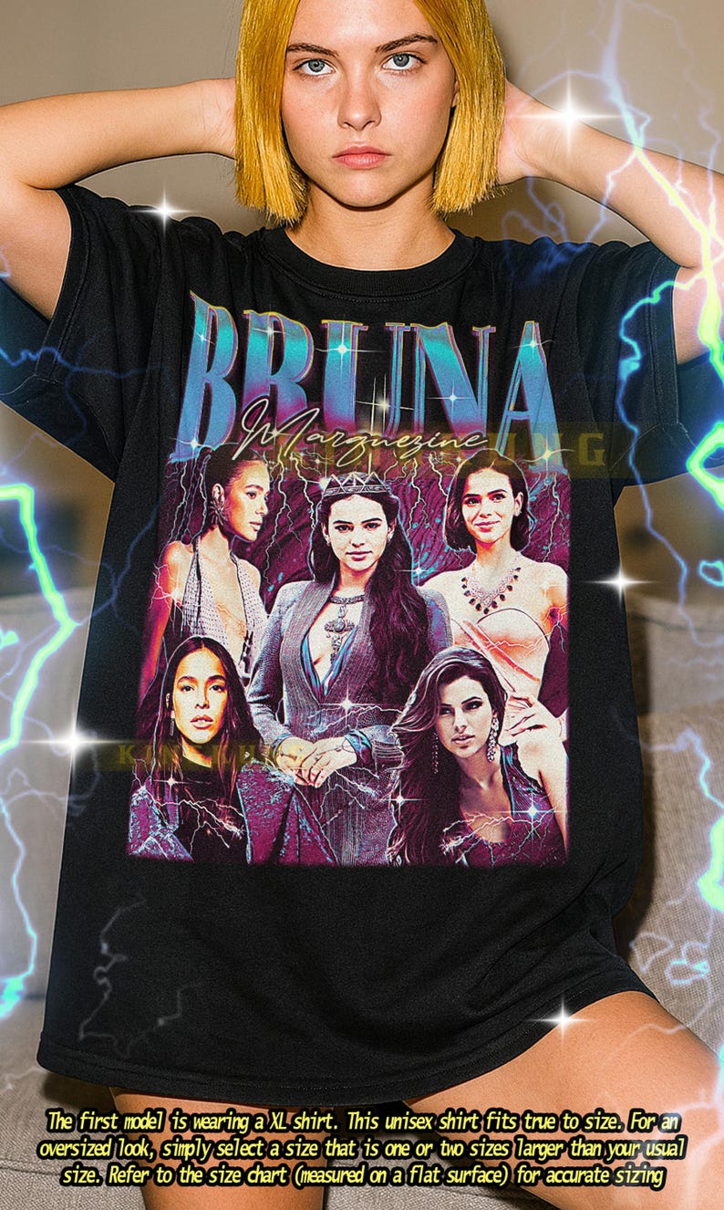 May include: Black t-shirt featuring a graphic of five women with the text "BRUINA" in a stylized font. The image has a vintage aesthetic with lightning bolt accents. A unisex shirt.