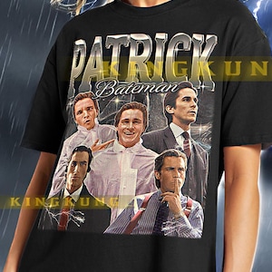 May include: Black t-shirt with a graphic print of Patrick Bateman from the movie American Psycho. The graphic features a collage of images of Christian Bale as Patrick Bateman in different scenes from the film. The text "PATRICK Bateman" is printed in gold letters on the shirt.