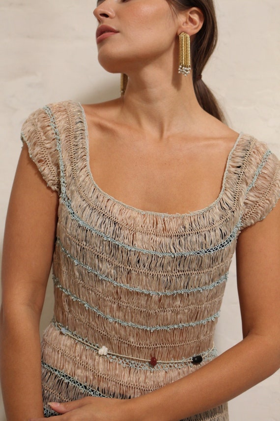 A 1940s crochet ribbon dress