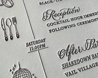 Invitaciones de boda personalizadas con caligrafía a mano en negro, marfil y dorado.