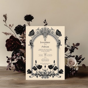 May include: An invitation card with an ornate black and white floral design. The card reads "Josephine and Adrian" and includes wedding details: date, time, and location. The card is surrounded by dark floral arrangements.