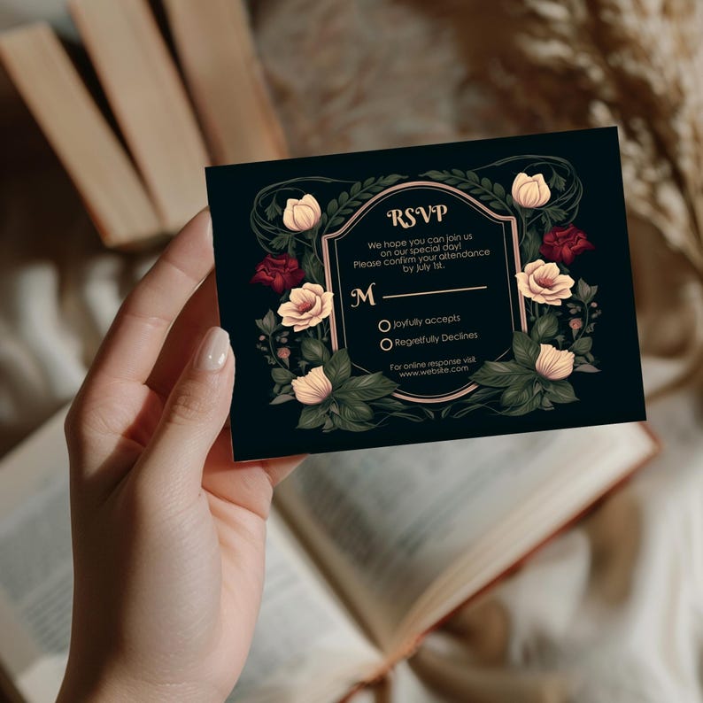 May include: Black RSVP card with gold trim and floral accents. The text reads "RSVP" and "We hope you can join us on our special day! Please confirm your attendance by July 1st. M Joyfully accepts Regretfully Declines For online response visit www.website.com"