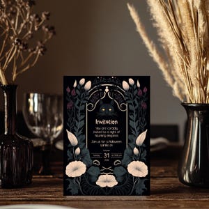 May include: A black and white Halloween invitation with a black cat peeking out from behind a floral design. The invitation reads "You are cordially invited to a night of haunting elegance. Join us for a Halloween soir&eacute;e on Sunday, October 31st at 5:00 pm 2026."