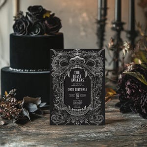 May include: A black and silver invitation with an ornate frame and a snarling beast's face. The text reads "The Beast Awakens" and invites guests to a 30th birthday party on 26th August at 1:00 PM. The location is Moon Villa 5, Avenue 234, 12345 Doton.