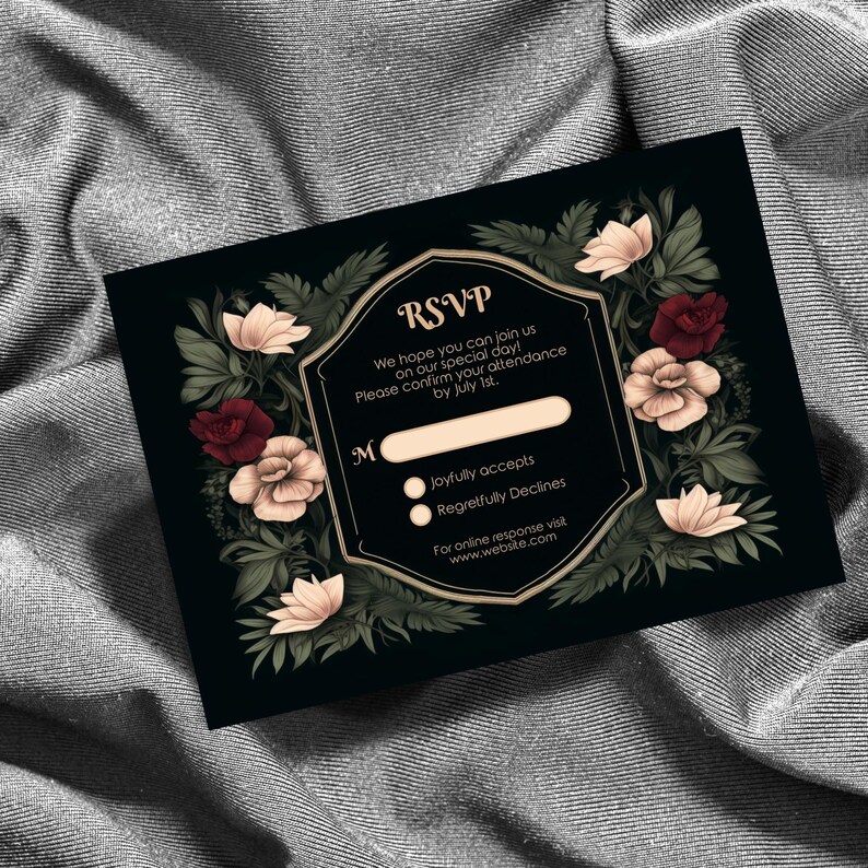 May include: Black RSVP card with gold trim and floral accents. The card has a section for a name and two options: Joyfully accepts and Regretfully Declines. The text reads: "RSVP We hope you can join us on our special day! Please confirm your attendance by July 1st. For online response visit www.website.com"