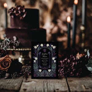 May include: A black wedding invitation with a floral design and the text "Josephine & Adrian" and "Aug 13, 2023".