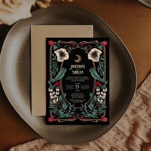 May include: A black wedding invitation with gold accents and floral illustrations. The invitation features a crescent moon and the text "Josephine and Adrian" with the date and time of the wedding.