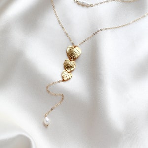 gold filled back necklace with cascading leaf pendant and freshwater pearls