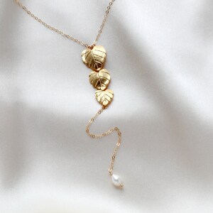 gold filled back necklace with cascading leaf pendant and freshwater pearls