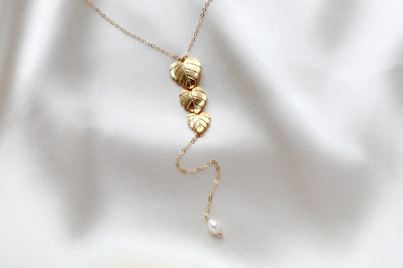 gold filled back necklace with cascading leaf pendant and freshwater pearls