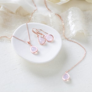 Rose gold back necklace and earrings set with ice pink gemstone