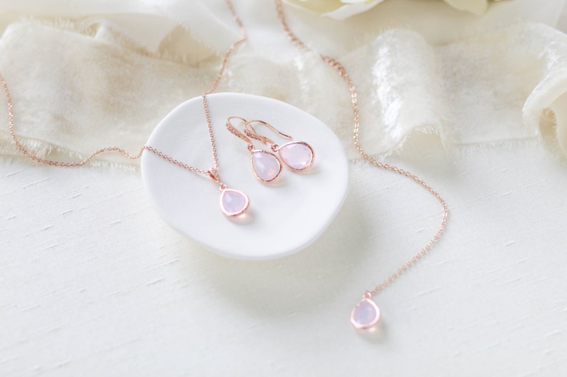 Rose gold back necklace and earrings set with ice pink gemstone