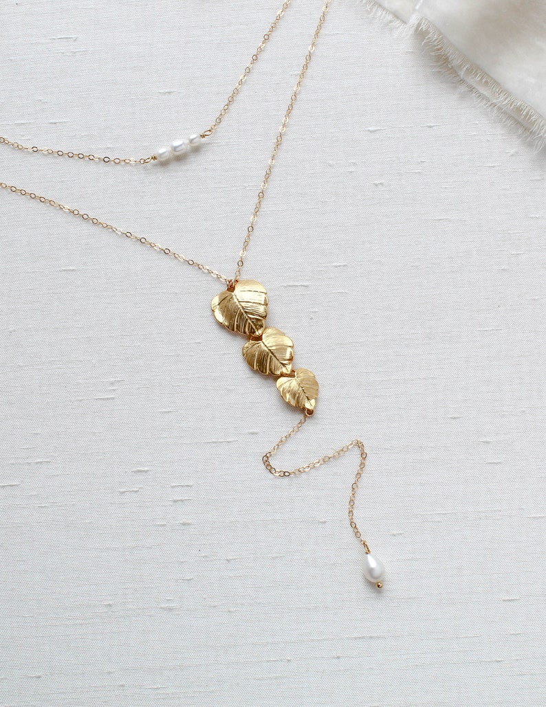 gold filled back necklace with cascading leaf pendant and freshwater pearls