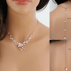 May include: A rose gold bridal necklace with a delicate floral design and pearl accents. The necklace is shown on a model wearing it as a choker. The image also shows two backdrops with rose gold chains and pearl accents, labeled "Backdrop A" and "Backdrop B".