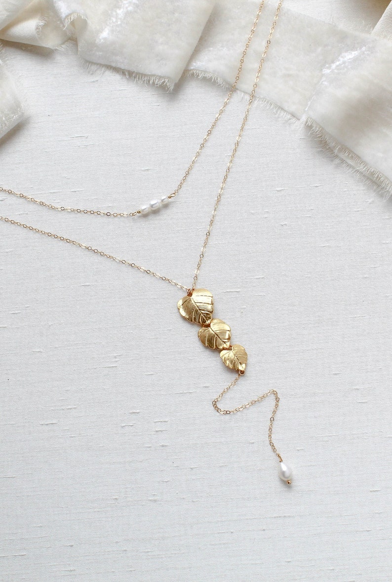 gold filled back necklace with cascading leaf pendant and freshwater pearls