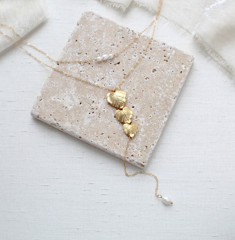 gold filled back necklace with cascading leaf pendant and freshwater pearls