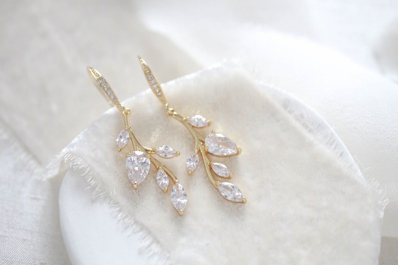 Delicate gold vine earrings with Cubic zirconia stones