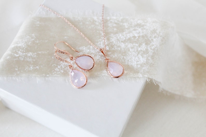 Rose gold necklace and earrings set with ice pink gemstone