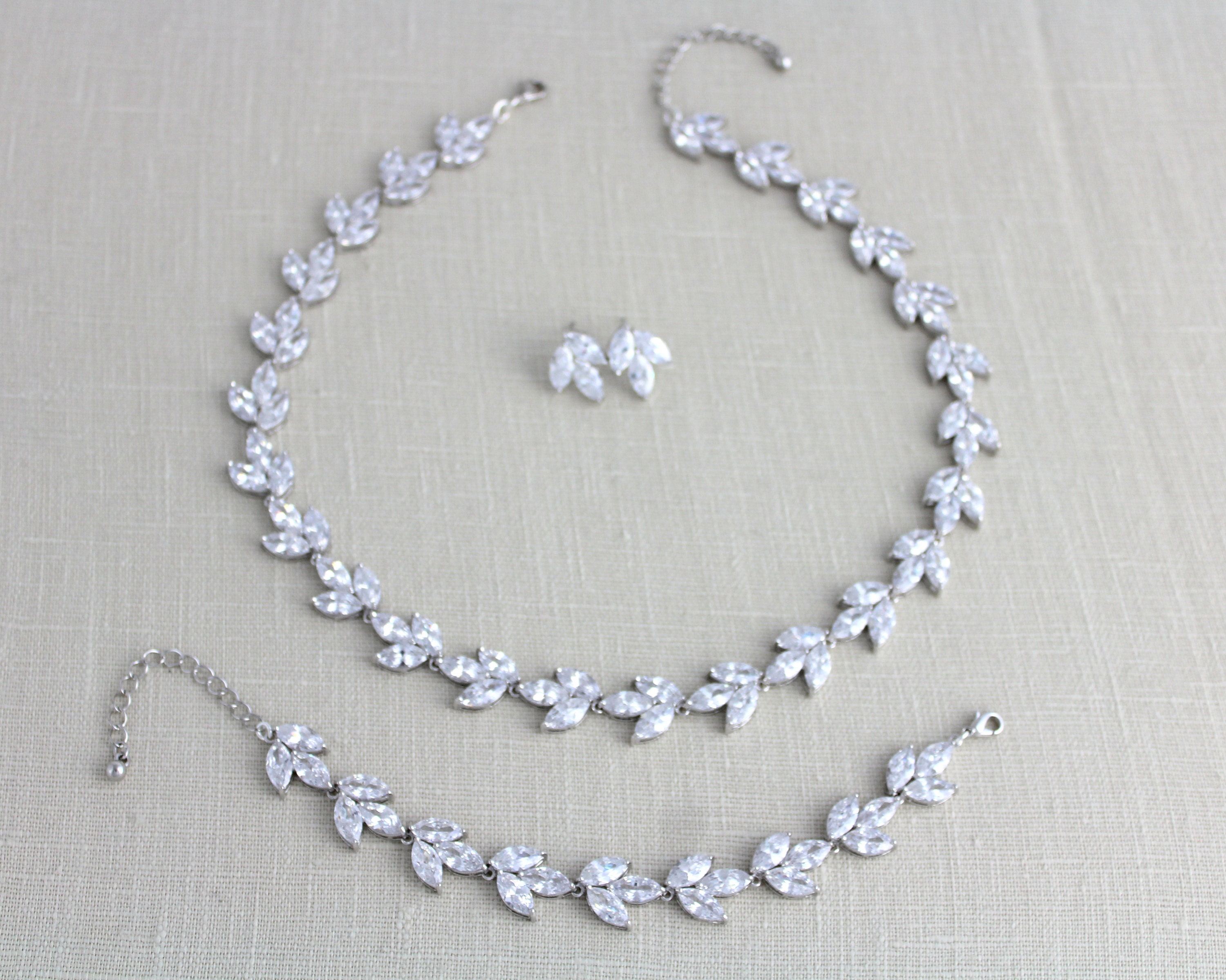 Parure Gioielli Numeri Romani Acciaio Inox Placcato Oro Rosa - Collana, Orecchini, Bracciale, Anello