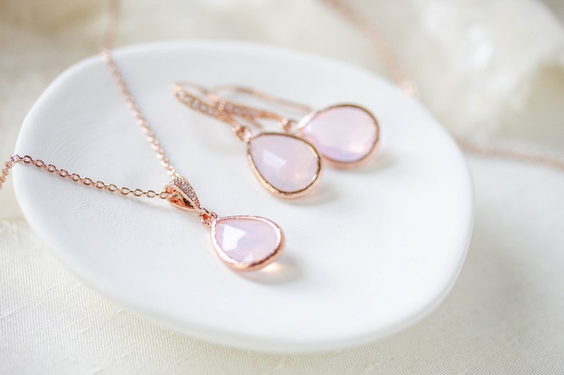 Rose gold necklace and earrings set with ice pink gemstone