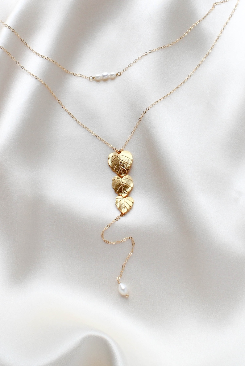 gold filled back necklace with cascading leaf pendant and freshwater pearls