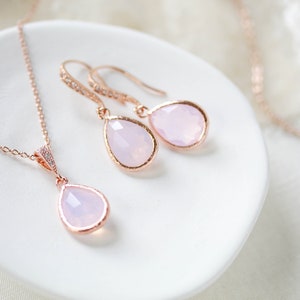 Rose gold necklace and earrings set with ice pink gemstone